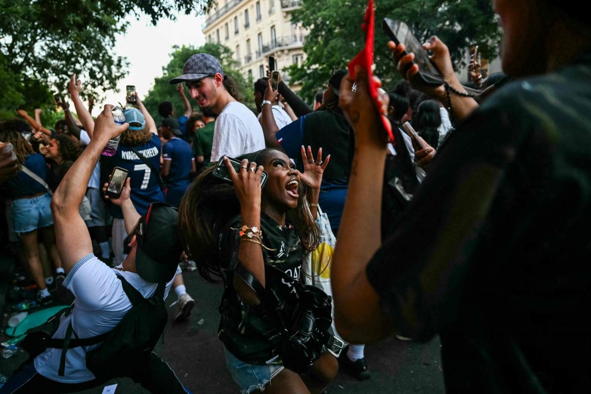 Paris celebrates PSG’s historic back-to-back champions league win with fireworks and clashes