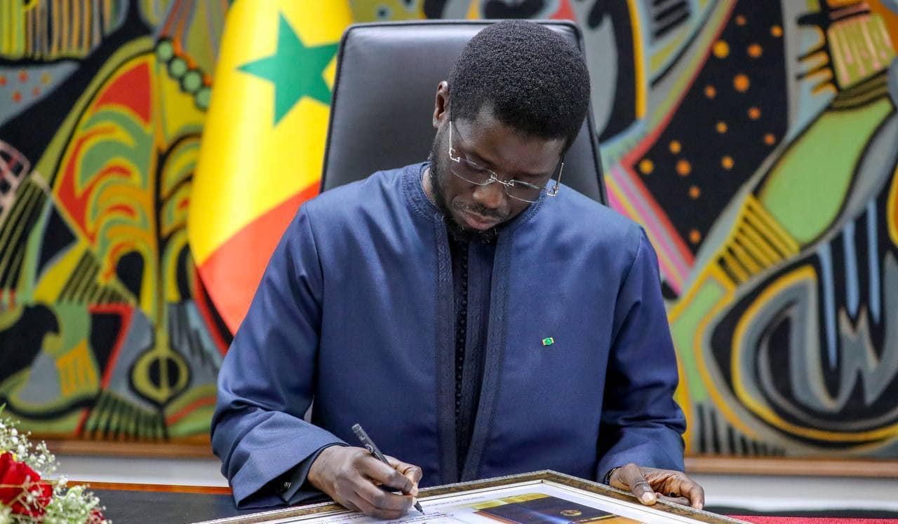 President Bassirou Diomaye and General Pape Cissé during the appointment signing