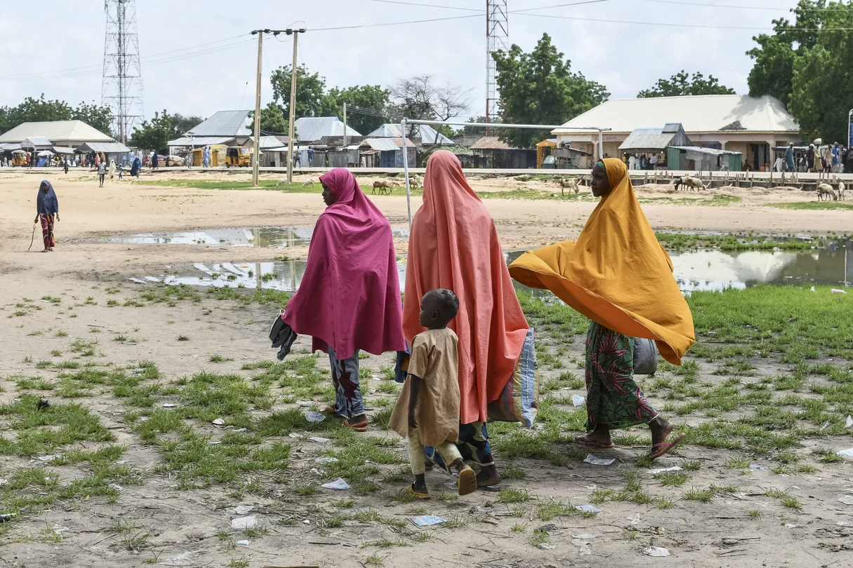Relatives of victims gather after a suspected Boko Haram attack in Babban Gide. At least 81 people were killed and several remain missing following a jihadist assault in Yobe State, northeastern Nigeria.