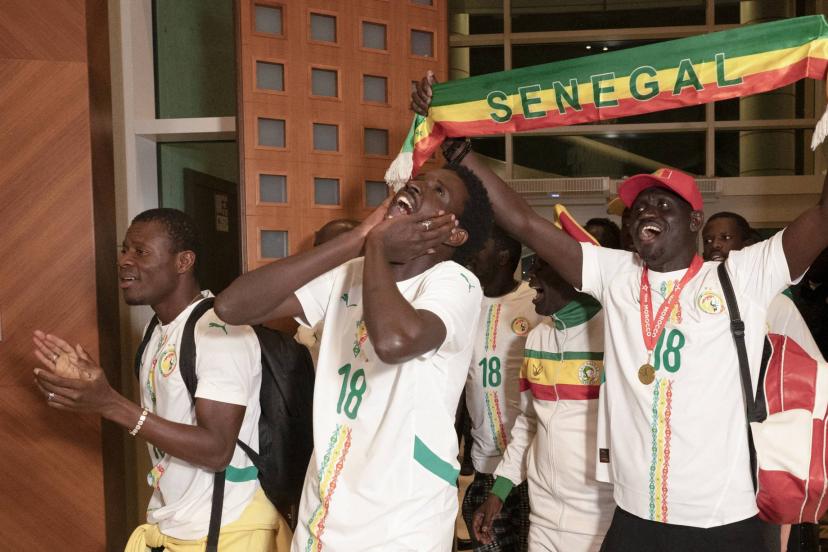 Senegalese supporters disembarking at Ndiass International Airport on Sunday morning