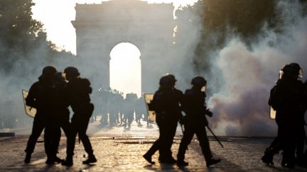 French riot police on the Champs-Élysées during PSG's Champions League celebrations in Paris