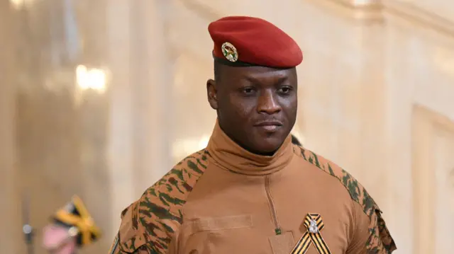 Burkina Faso military leader Ibrahim Traore in uniform with red hat