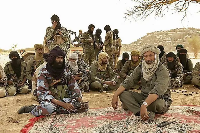 Touareg rebels gathered under a tree