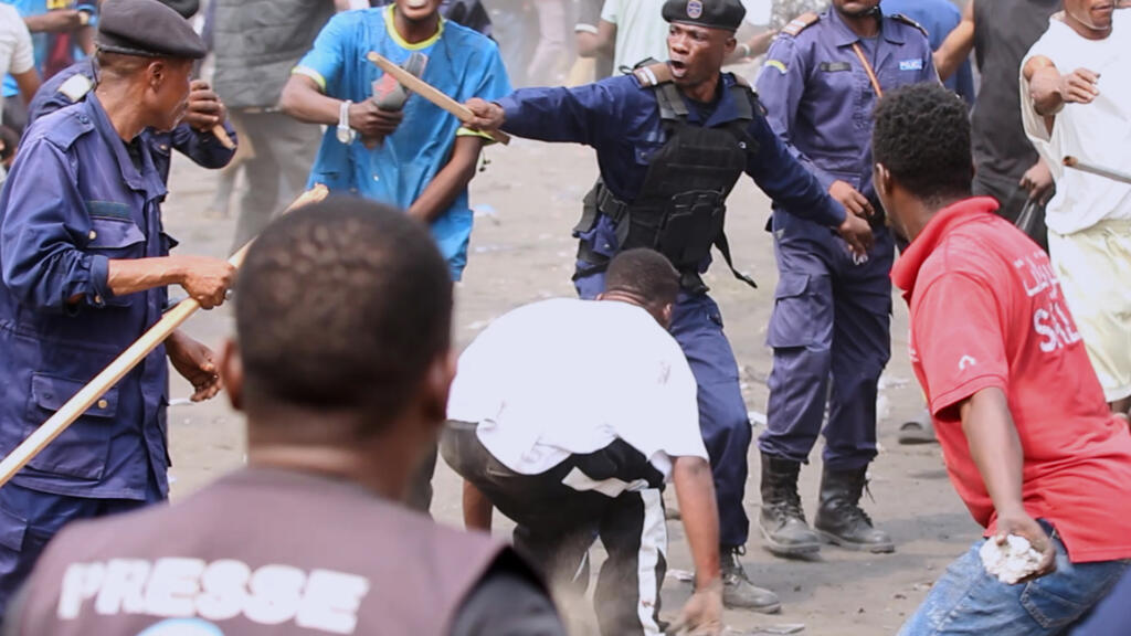 Clashes between police and protesters in Kinshasa during a June 2026 demonstration against constitutional changes in the DRC