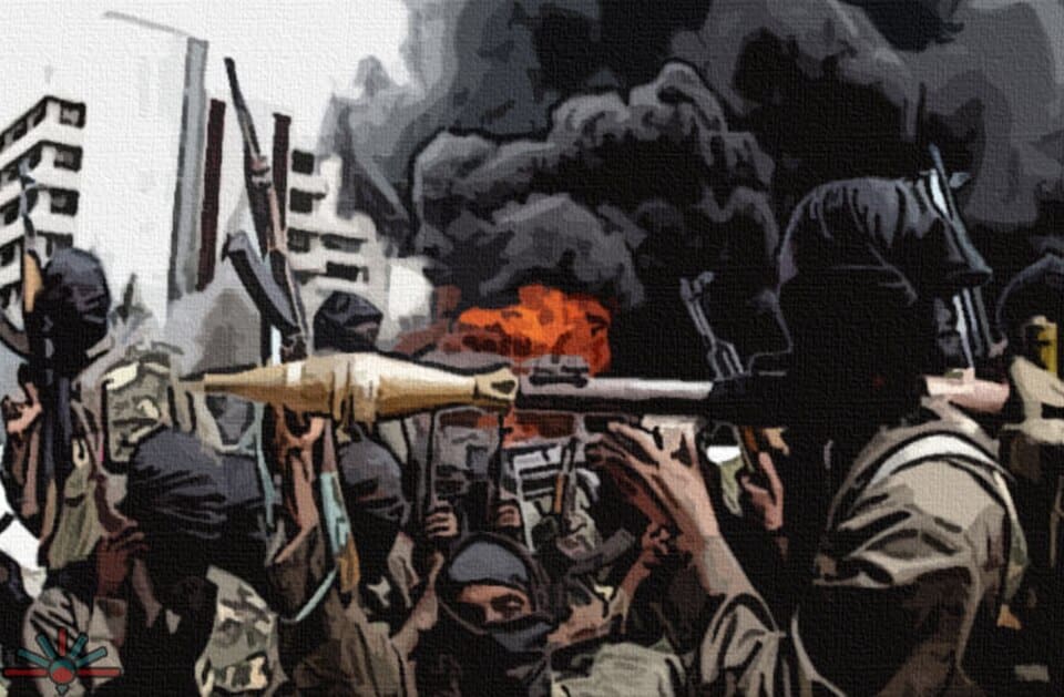 A masked Boko Haram fighter standing in a dusty landscape