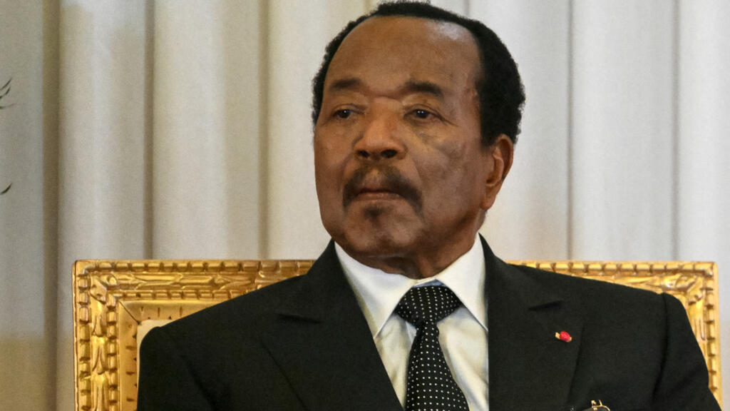 Cameroonian President Paul Biya watches Pope Leo XIV (off-camera) deliver a speech at the presidential palace in Yaoundé on the third day of an 11-day apostolic journey to Africa, April 15, 2026.