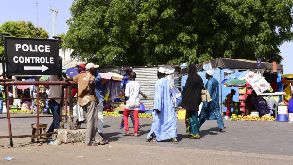 Border checkpoint at Karang, Senegal, May 10, 2016, where travelers pass through police control to enter Gambia.