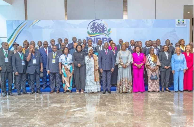 Retired Gabonese citizens receiving recognition during a national event